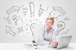 Attractive businesswoman brainstorming with drawn arrows and sym
