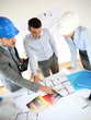 Photo: Team of architects presenting construction project Team of architects presenting construction project
