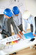 Team of architects presenting construction project