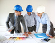 Team of architects presenting construction project