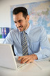 Smiling businessman working in office