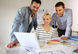 Team of architects presenting construction project