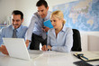 Business people meeting in office with laptop
