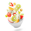 Light salad with flying fresh fruits