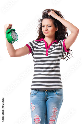 Photo: Girl with alarm clock Girl with alarm clock