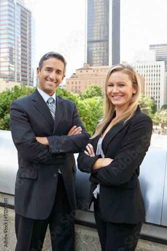 Photo: Portrait Of Two Business Colleagues Outside Office Portrait Of Two Business Colleagues Outside Office