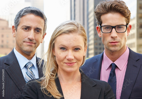 Photo: Portrait Of Three Business Colleagues Outside Office Portrait Of Three Business Colleagues Outside Office