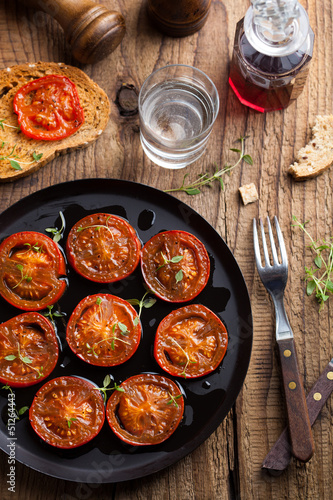 Photo: baked tomatoes with herbs and olive oil baked tomatoes with herbs and olive oil
