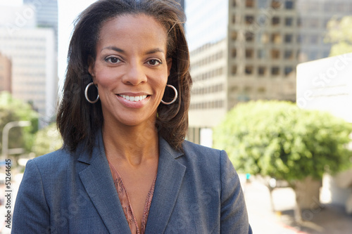 Photo: Portrait Of Businesswoman Outside Office Portrait Of Businesswoman Outside Office
