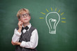 canvas print picture - Schoolboy at the Blackboard with Idea