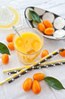 canvas print picture - Fresh juice from oranges and kumquats