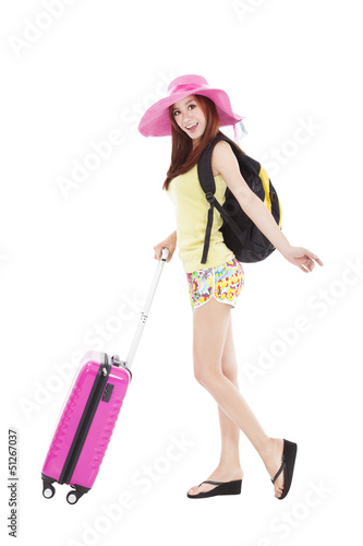 Photo: young female styled in summer outfit with travel case young female styled in summer outfit with travel case