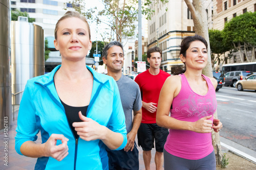 Photo: Group Of Runners On Urban Street Group Of Runners On Urban Street