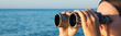 a woman is looking to the binocular