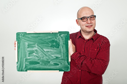 Photo: Man with chalkboard Man with chalkboard