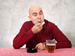 Photo: Beer drinker lighting up a cigarette Beer drinker lighting up a cigarette