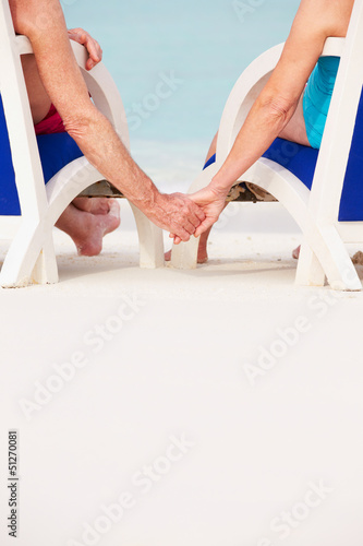 Photo: Close Up Of Senior Couple Holding Hands Beach In Chairs Close Up Of Senior Couple Holding Hands Beach In Chairs