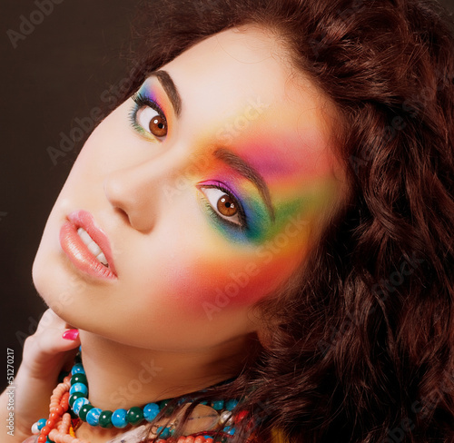 Photo: Multicolored Woman's Face. Vibrant Colorful Rainbow Makeup Multicolored Woman's Face. Vibrant Colorful Rainbow Makeup