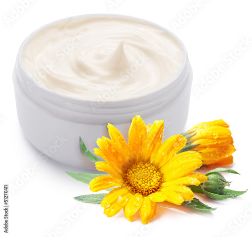 Photo: Jar of cream and calendula flower. Jar of cream and calendula flower.