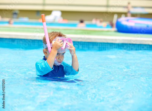 Photo: Boy wearing a mask for diving Boy wearing a mask for diving