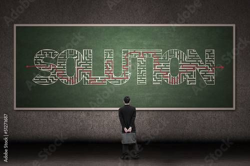 Photo: Businessman looking for solution Businessman looking for solution