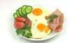 Plate with fried eggs. Seamless