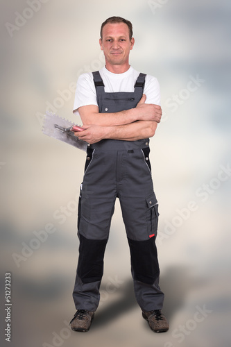Photo: Handwerker mit Kelle Handwerker mit Kelle
