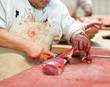 Fleischer im Schlachthof // butcher in slaughterhouse
