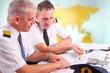 Photo: Airline pilots filling in papers in ARO Airline pilots filling in papers in ARO