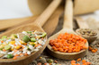 Wooden spoons with different kinds of groats