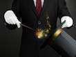 Magician performance on dark background