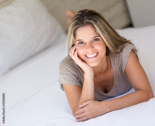 Photo: Woman lying in bed Woman lying in bed