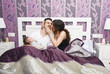 Dad do the baby sleeps and receives a reward kiss.