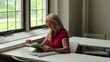 Professor reading a textbook
