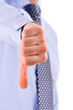 Business man showing thumbs down sign.
