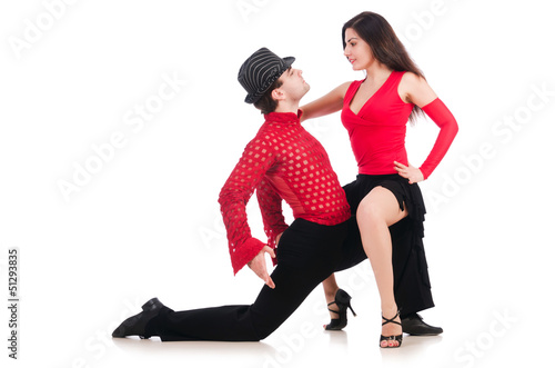 Photo: Pair of dancers isolated on the white Pair of dancers isolated on the white