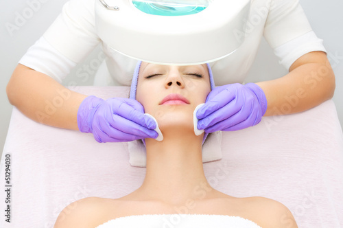 Photo: Young woman receiving beauty therapy Young woman receiving beauty therapy