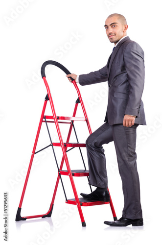 Photo: Businessman in career ladder concept Businessman in career ladder concept