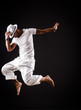 Dancer dancing dances in white clothing