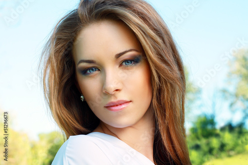 Photo: Young woman outdoors Young woman outdoors