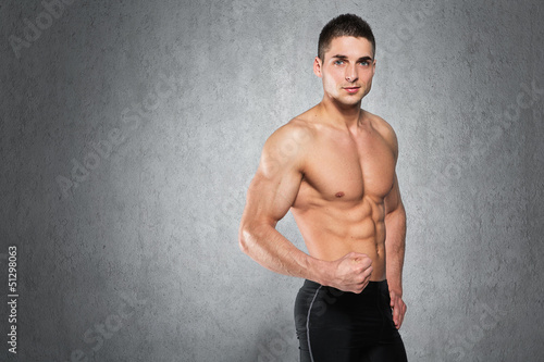 Photo: Handsome muscular man Handsome muscular man