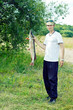 Fisherman Holding Large Pike