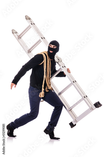 Photo: Burglar wearing balaclava isolated on white Burglar wearing balaclava isolated on white