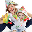 Mother and her son have a lot of fun to paint with colours