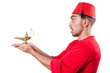 Turkish man with lamp on white