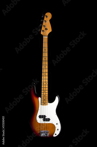 Photo: bass guitar on black background bass guitar on black background