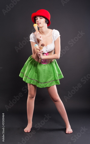 Photo: Pretty girl in german style with ice cream Pretty girl in german style with ice cream