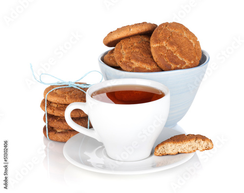 Photo: Tea cup with homemade cookies Tea cup with homemade cookies
