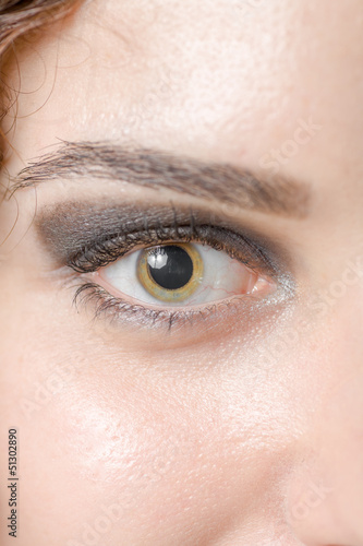 Photo: Macro shot of woman's eye with long eyelashes sensual look Macro shot of woman's eye with long eyelashes sensual look