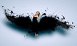Woman floating   on dark wings